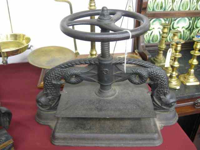 Appraisal: th Century Book Press model fancy dolphin arms top wheel