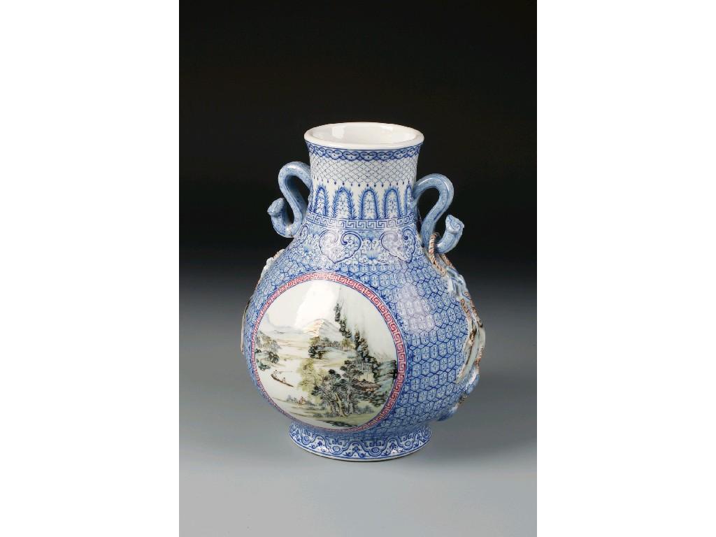 Appraisal: A CHINESE FAMILLE VERTE VASE decorated with circular landscape panels