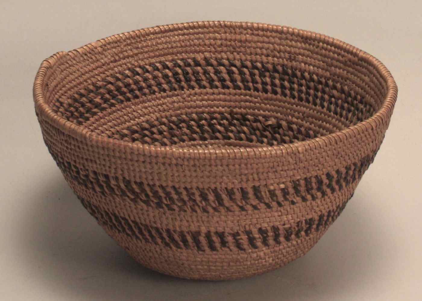 Appraisal: CALIFORNIA INDIAN WOVEN BASKETEarly th CenturyIn conical form with darker