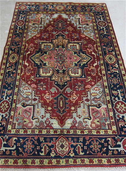 Appraisal: HAND KNOTTED ORIENTAL AREA RUG Persian Serapi design ' x