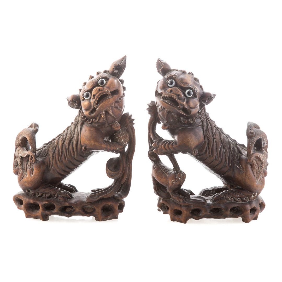 Appraisal: Pair carved wood foo dogs th century with painted inset