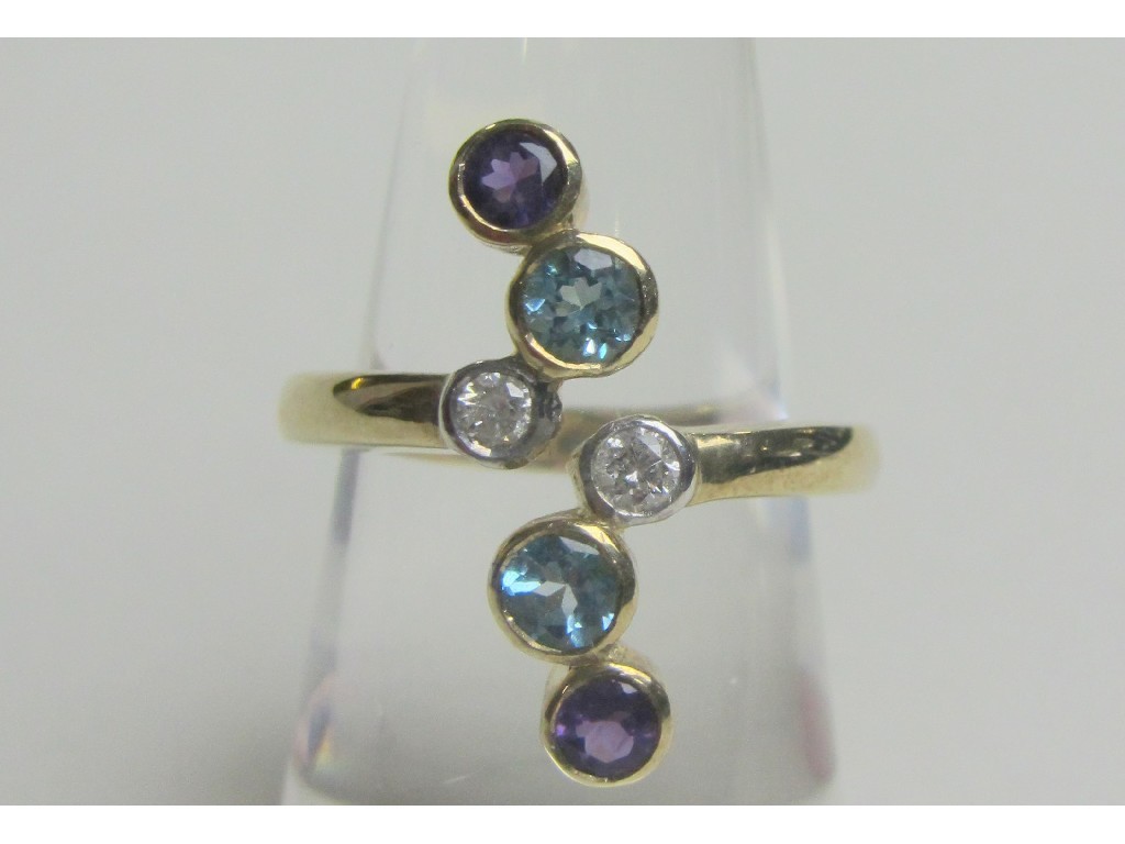 Appraisal: Nine carat gold blue topaz amethyst and diamond set dress