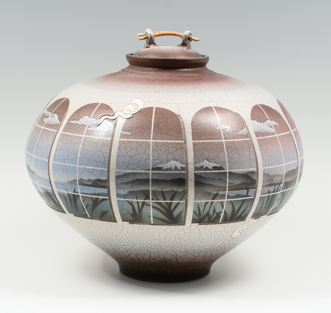 Appraisal: KEN JENSEN RAKU POTTERY VASE Large Raku Pottery lidded Vase