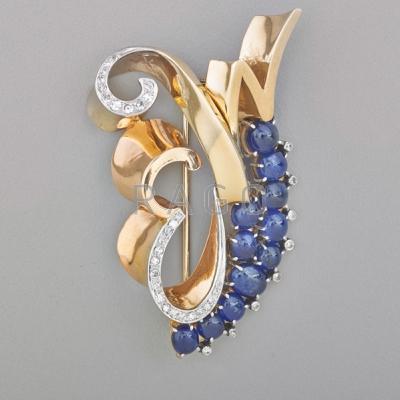 Appraisal: TRABERT HOEFFER MAUBOUSSIN REFLECTION BROOCH Eleven cabochon cut blue sapphires