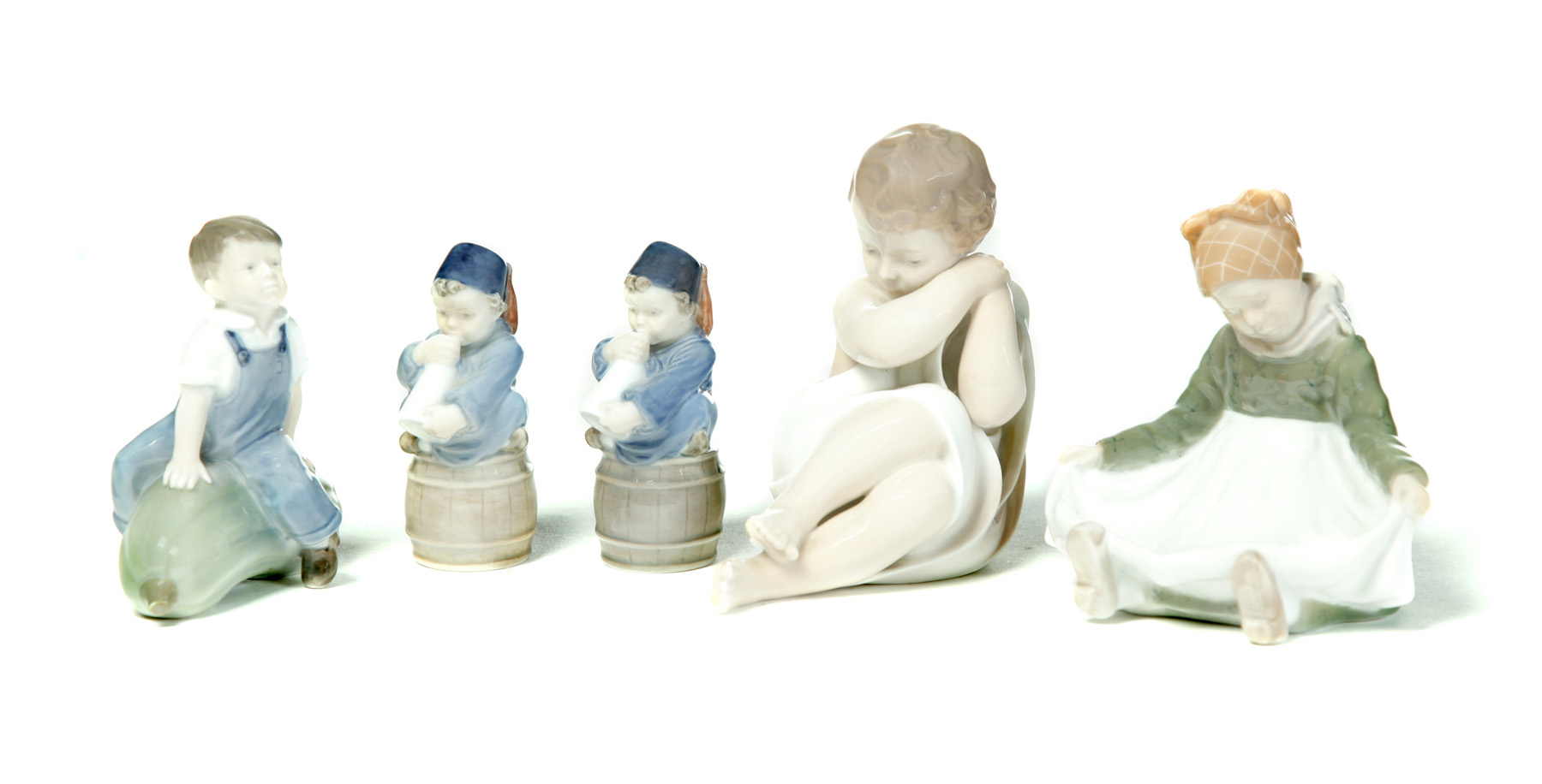 Appraisal: FIVE ROYAL COPENHAGEN FIGURINES OF CHILDREN Denmark nd half- th