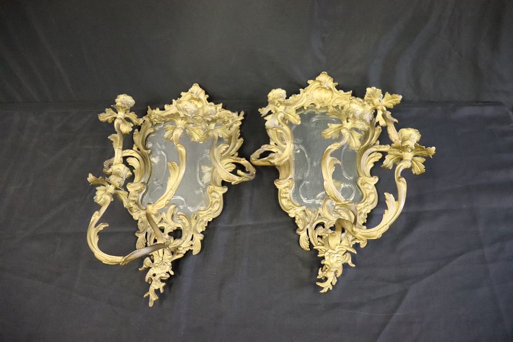 Appraisal: An Antique Pair Of Louis XV Style Bronze Sconces With