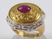 Appraisal: A yellow amd white metal tests carat gold cabochon ruby