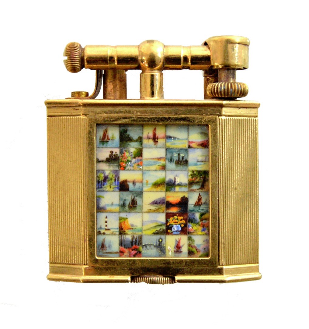 Appraisal: A ct gold Dunhill petrol lighter the body of rectangular