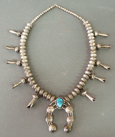 Appraisal: - Large Southwest Indian silver squash blossom necklace with a