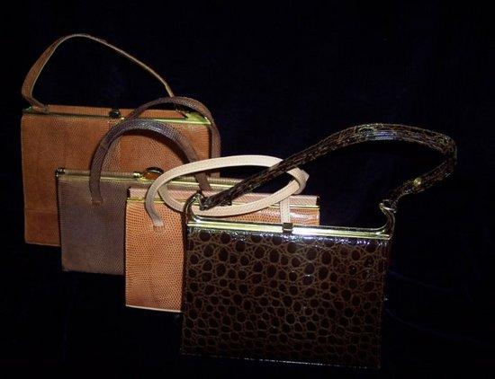 Appraisal: Three snakeskin handbags and a crocodile skin handbag