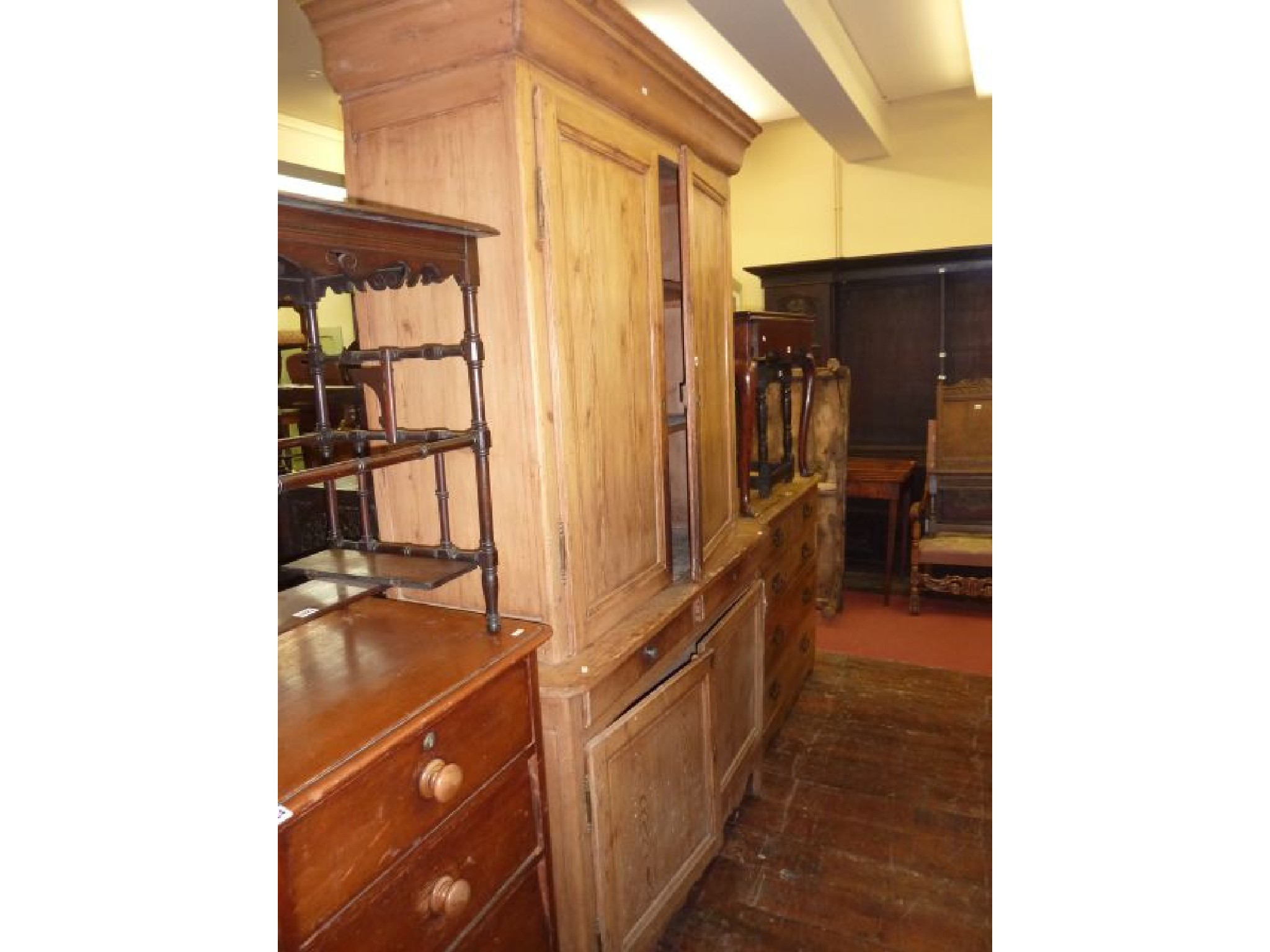 Appraisal: A th century stripped and waxed continental pine kitchen dresser