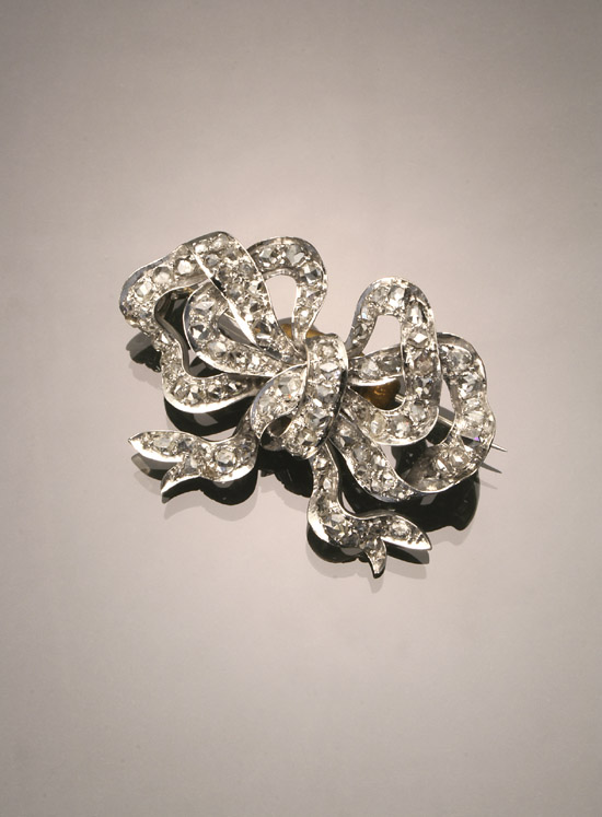 Appraisal: Palladium and Diamond Bowknot Brooch Set with ninety rose-cut diamonds