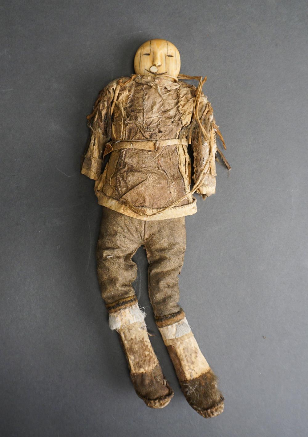 Appraisal: ESKIMO DOLL WITH CARVED WALRUS TUSK HEAD WITH INKED AND