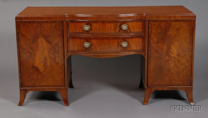 Appraisal: Mahogany Serpentine-fronted and Crossbanded Sideboard th century fitted with two