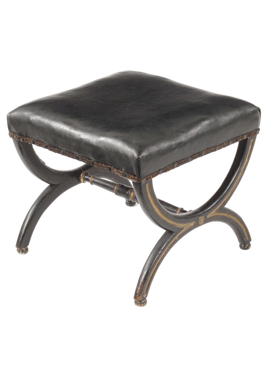 Appraisal: A William IV ebonised and parcel gilt X frame stool