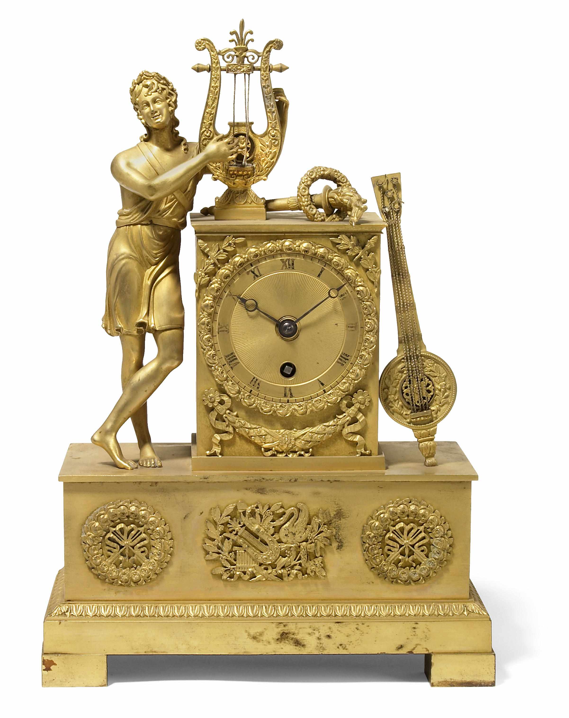 Appraisal: An Empire gilt bronze figural mantel timepiece early th century