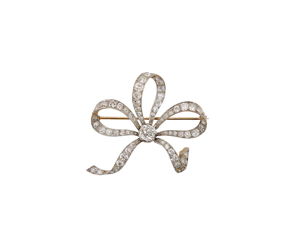 Appraisal: Platinum Gold and Diamond Bow Brooch Platinum Gold and Diamond