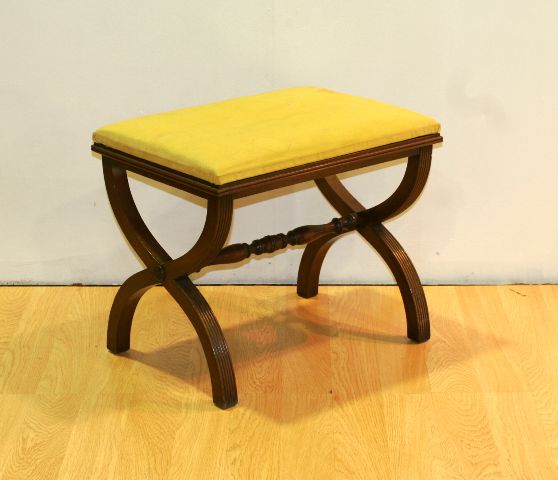 Appraisal: A Edwardian mahogany stool with yellow upholstered cushion cm wide