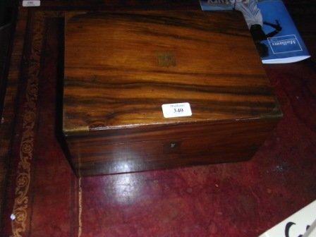 Appraisal: A VICTORIAN ROSEWOOD AND BRASS MOUNTED TRAVELLING WRITING BOX