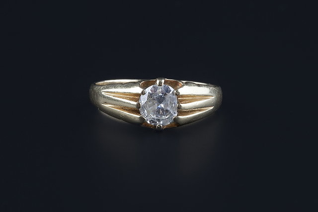 Appraisal: A diamond single stone ring the brilliant-cut diamond in gypsy