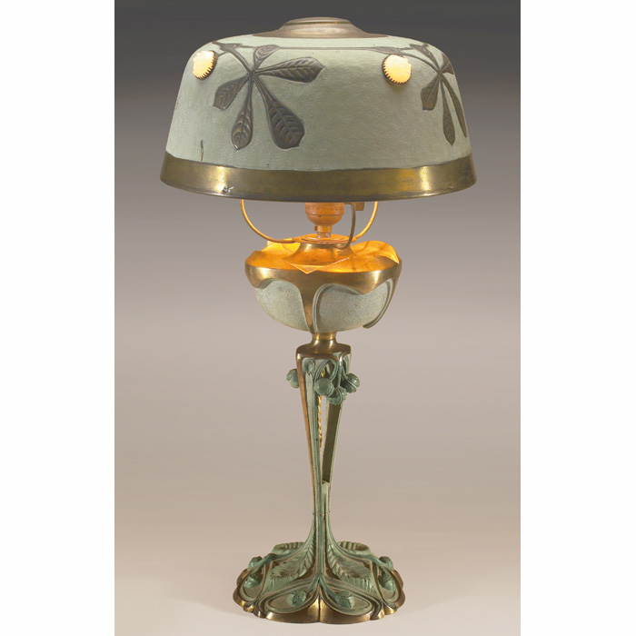 Appraisal: G Leleu table lamp bronzed metal base with a green