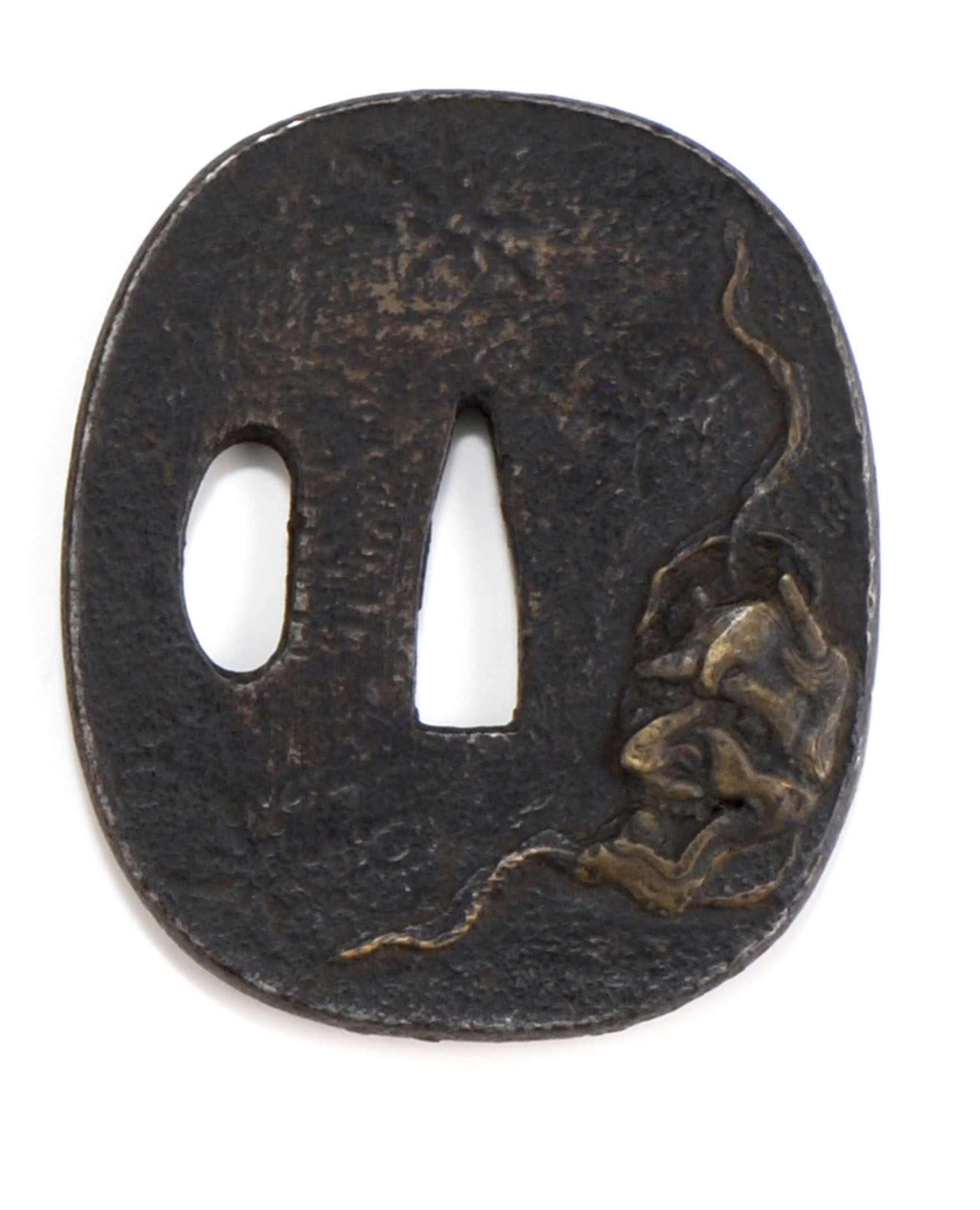 Appraisal: IRON NAGA MARU-GATA TSUBA th CenturyWith relief depiction of a