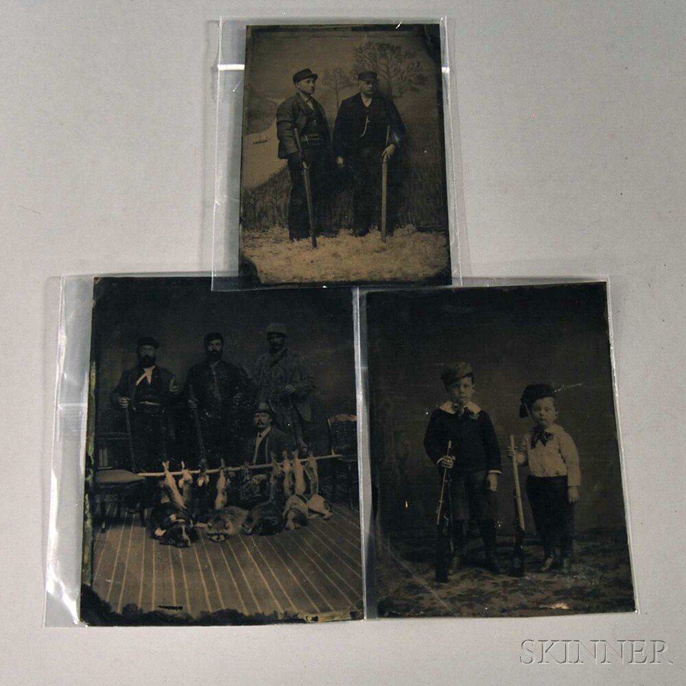 Appraisal: Three Tintypes Depicting Hunters one depicting four gentlemen with firearms