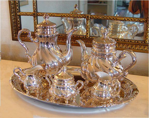 Appraisal: CARL SPAHR SILVER OVERLAY PC TEA SERVICE Silberporzellan silver on