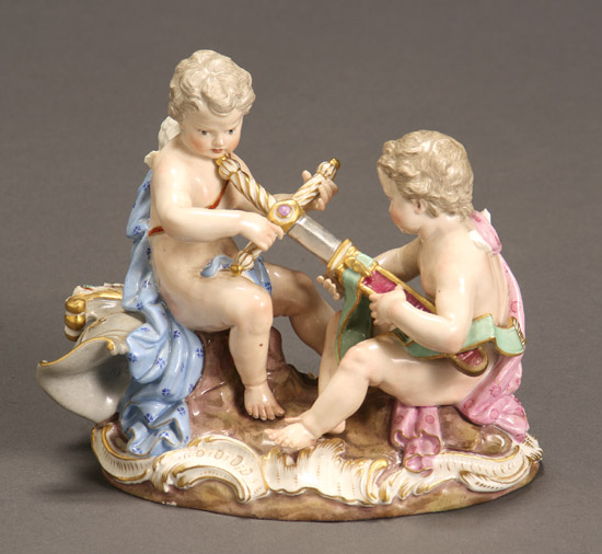 Appraisal: Meissen Figural Group of Two Putti with Sword th Century