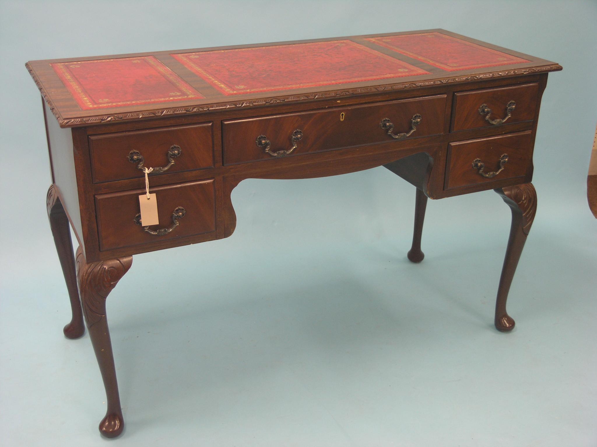 Appraisal: A period-style mahogany writing table top with inset gilt-tooled leather