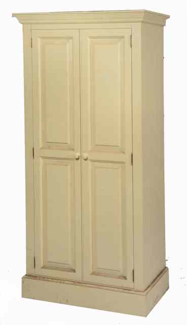 Appraisal: A WHITE PAINTED CUPBOARD the two twin panelled doors opening