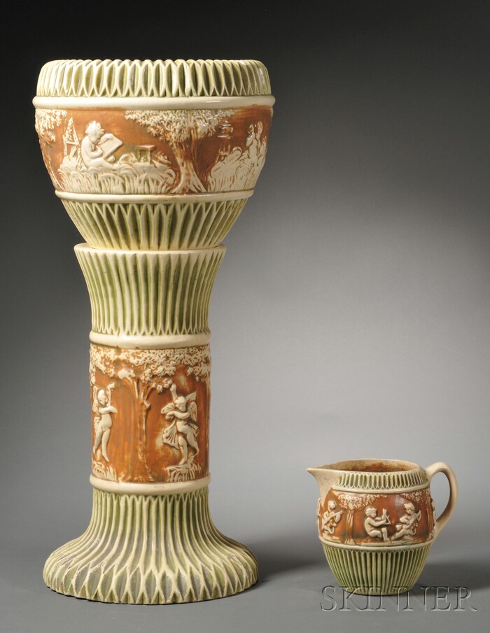 Appraisal: Roseville Donatello Pattern Jardiniere Pedestal and Pitcher Molded decorated pottery