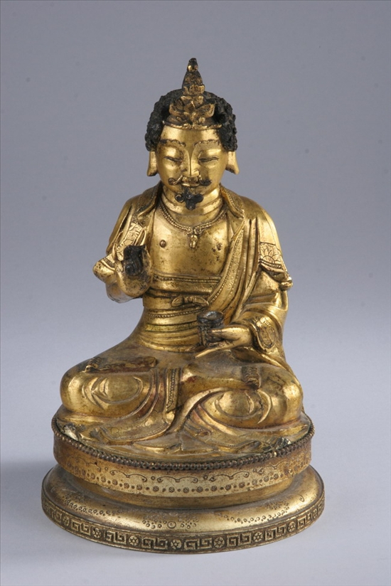 Appraisal: CHINESE GILT- BRONZE FIGURE OF AVALOKITESVARA Ming Dynasty Bodhisattva seated