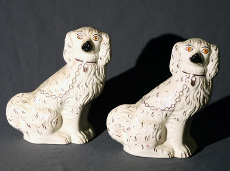 Appraisal: Pair of Staffordshire Figures of Spaniels Height in cm