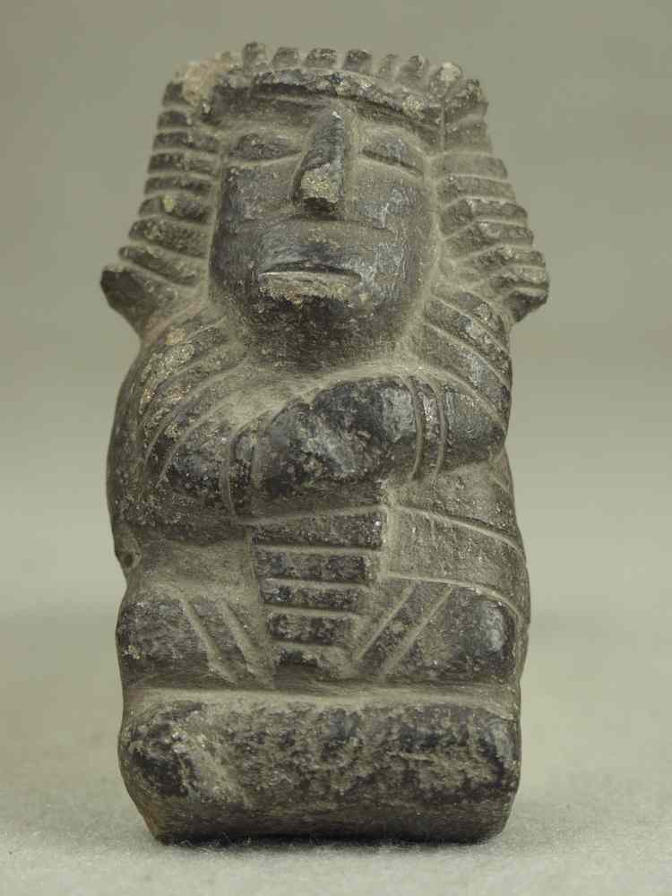 Appraisal: STONE SCULPTURE - Pre-Columbian basalt shaman figure possibly Teteoinnan ca