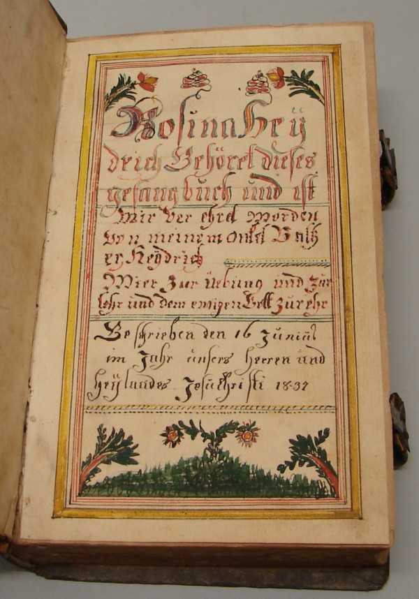 Appraisal: Fraktur features German script dated at bottom colorful yellow border