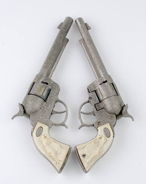 Appraisal: A Gene Autry pair of collectible cap guns s Made