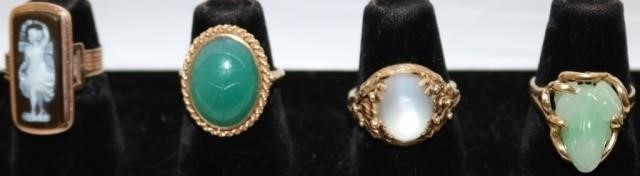 Appraisal: FOUR KT GOLD LADY'S RINGS TO INCLUDE CARVEDJADE WITH FROG