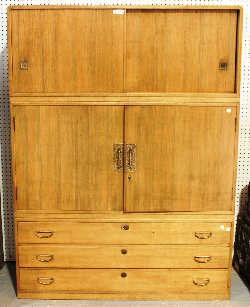 Appraisal: A th century Japanese soft wood three section side cabinet