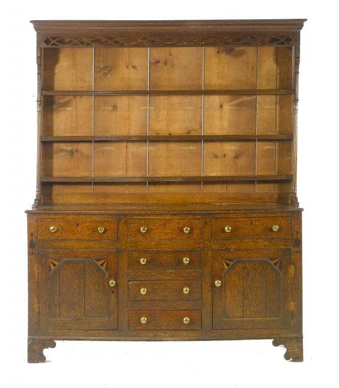 Appraisal: AN EARLY VICTORIAN INLAID OAK DRESSER NORTH WALES the rack