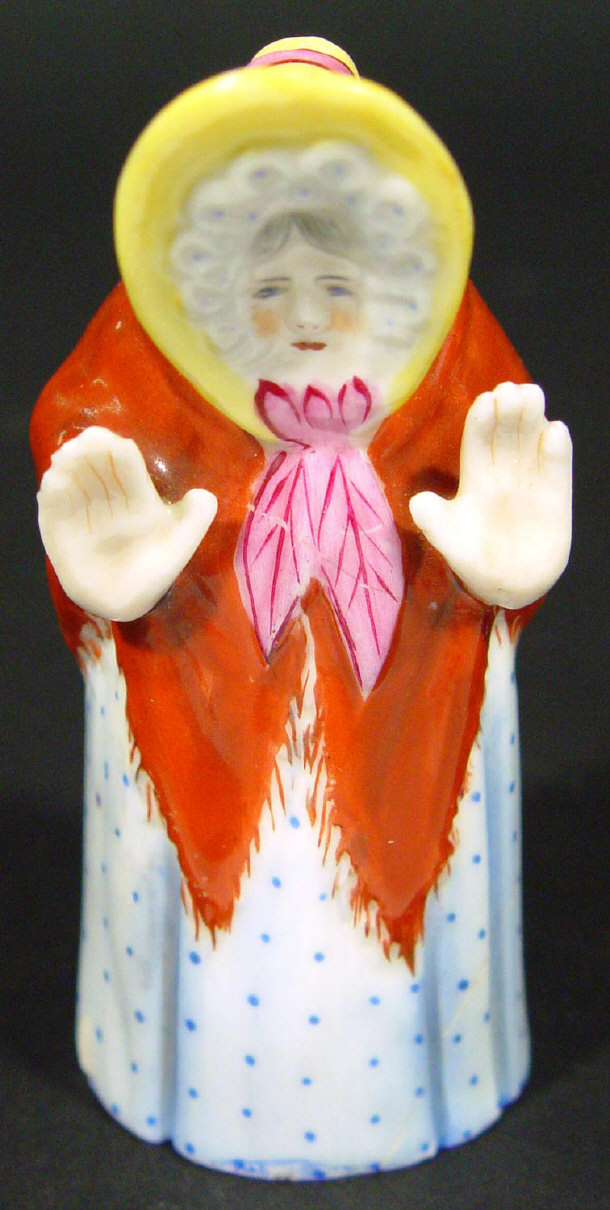 Appraisal: Royal Worcester china granny candlesnuffer with hand painted decoration and