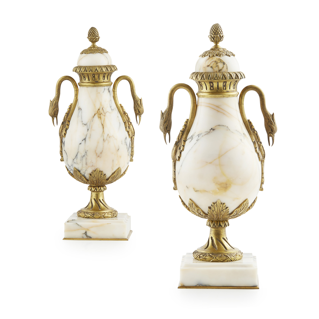 Appraisal: PAIR OF FRENCH GILT BRONZE MOUNTED MARBLE URNS LATE TH