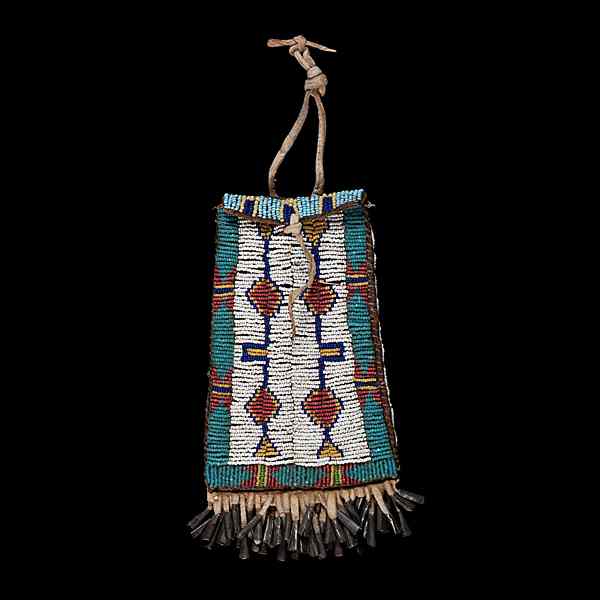 Appraisal: Sioux Beaded Hide Strike-a-Light sinew-sewn on commercial leather and decorated