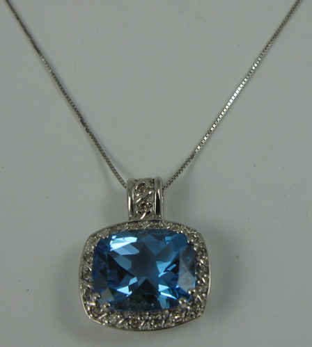 Appraisal: BLUE TOPAZ DIAMOND AND WHITE GOLD PENDANT NECKLACE with appraisal