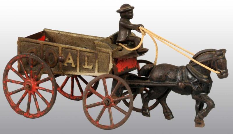 Appraisal: Cast Iron Tin Hubley Coal Wagon Toy Description Front rear