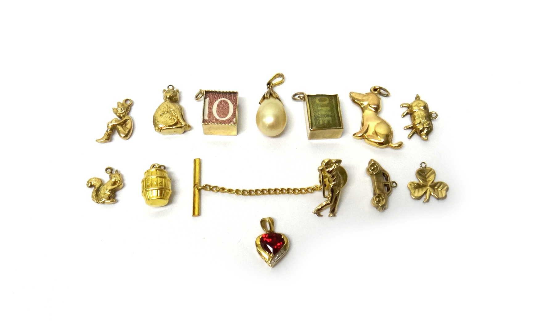 Appraisal: Ten ct gold charms including a squirrel a cat a