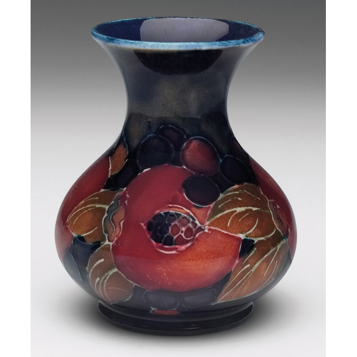 Appraisal: Moorcroft vase decorated with a rich pomegranate design impressed mark