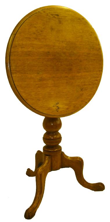 Appraisal: Victorian golden oak occasional table the circular tilt top over