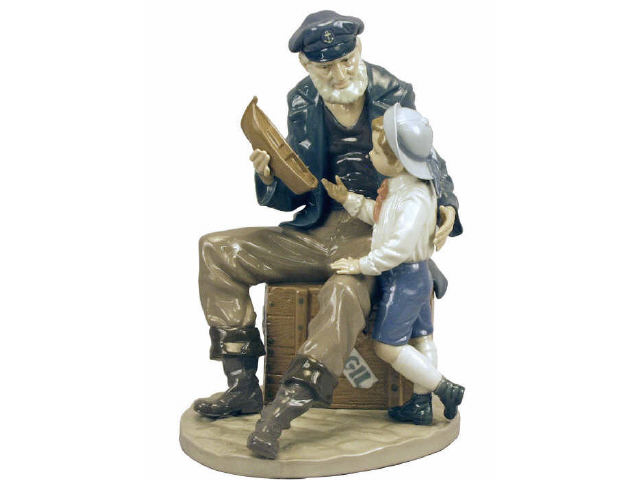 Appraisal: Fine Lladro figurine number depicting old sailor giving a young