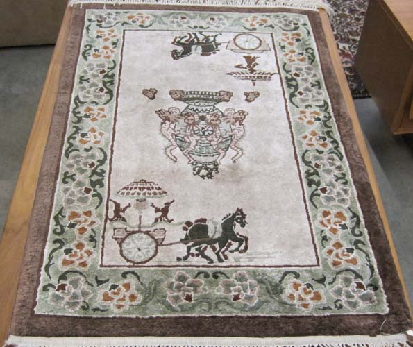 Appraisal: CHINESE SILK MAT hand knotted pictorial design on light tan